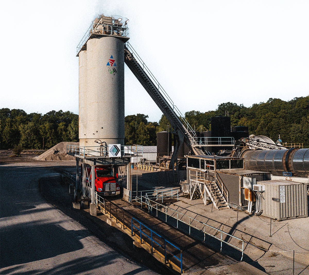 Asphalt haul truck picking up asphalt from Capital asphalt plant