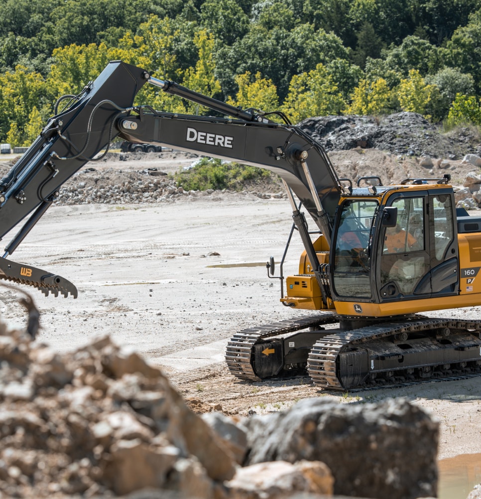 Capital Academy equipment operator student using an excavator