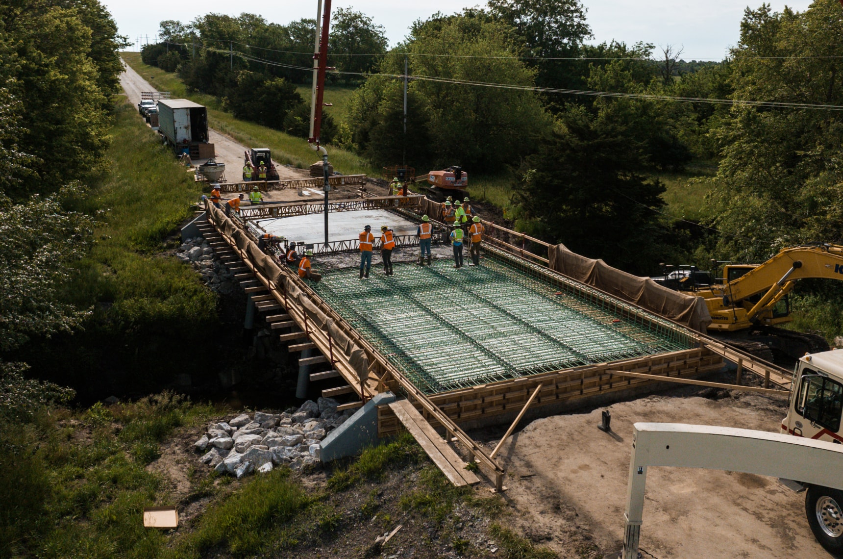 Concrete bridge construction with concrete rebar and concrete pump truck