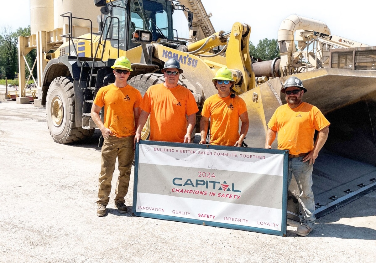 Group of 4 Capital employees receiving the Capital Champions of Safety award